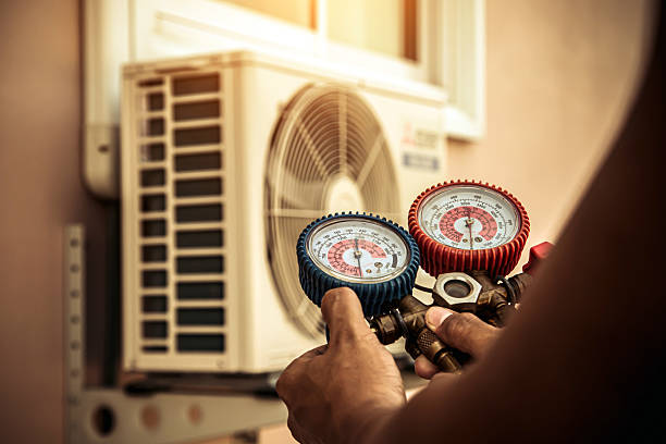 Professional Air Conditioning Service technician working in Noble, OK